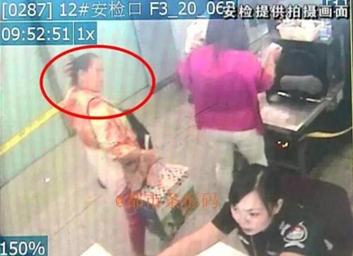 หญิงจีนซ่อนมีดในมวยผม หญิงจีนซ่อนมีดในมวยผม