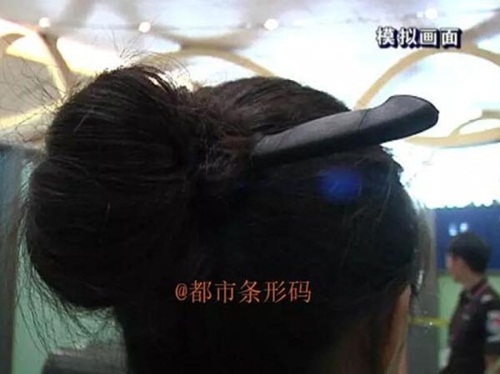 หญิงจีนซ่อนมีดในมวยผม หญิงจีนซ่อนมีดในมวยผม