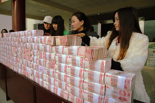 อู้ฟู่ ชาวนาหมู่บ้านจีนสร้างกำแพงเงินสด อวดทำการเกษตรได้ดี อู้ฟู่ ชาวนาหมู่บ้านจีนสร้างกำแพงเงินสด อวดทำการเกษตรได้ดี