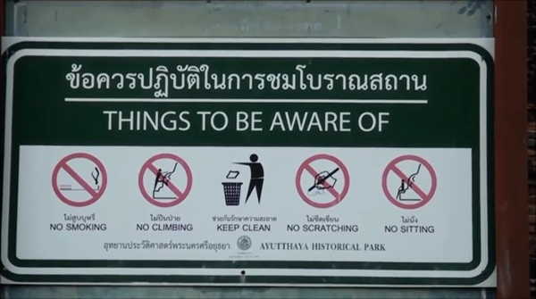 นั่งตักแชะภาพพระพุทธรูป นั่งตักแชะภาพพระพุทธรูป