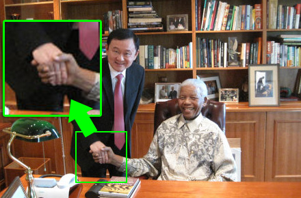 จับผิดภาพ ทักษิณ จับมือ แมนเดลา  