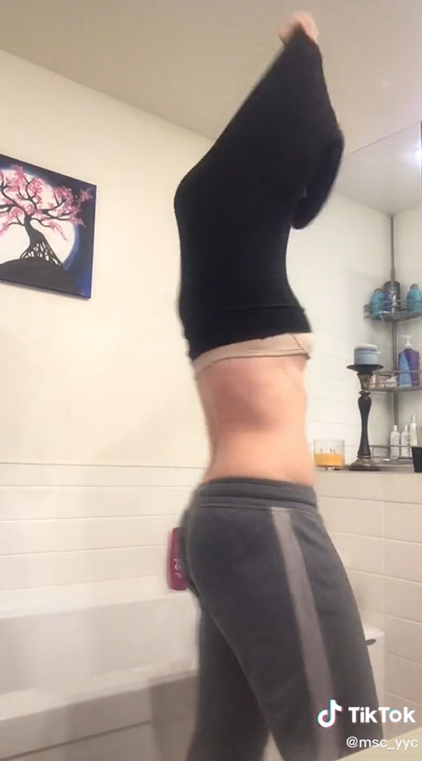 สาวถอดเสื้อไม่ออกอัดคลิปขอให้แฟนกลับมาช่วย