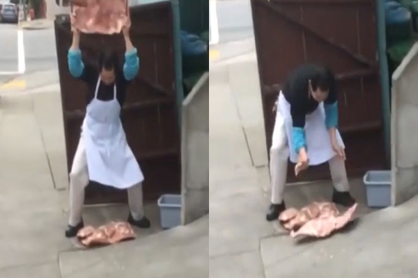 ร้านอาหารจีนในสหรัฐฯ เอาเนื้อหมูมาฟาดให้นุ่มบนทางเท้า