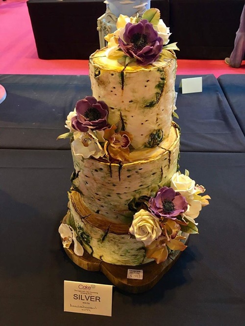 คนไทยปั้นน้ำตาลพานพุ่มสักการะพ่อหลวง คว้ารางวัลระดับโลก