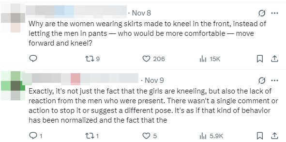 ศิลปินหญิงคุกเข่านั่งพื้น ศิลปินชายยืนกันนิ่ง