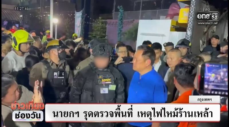 ชายแต่งทหารเต็มยศเดินข้างนายกฯ คือใคร