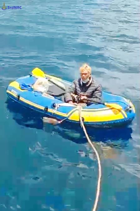 พายเรือกลางทะเล