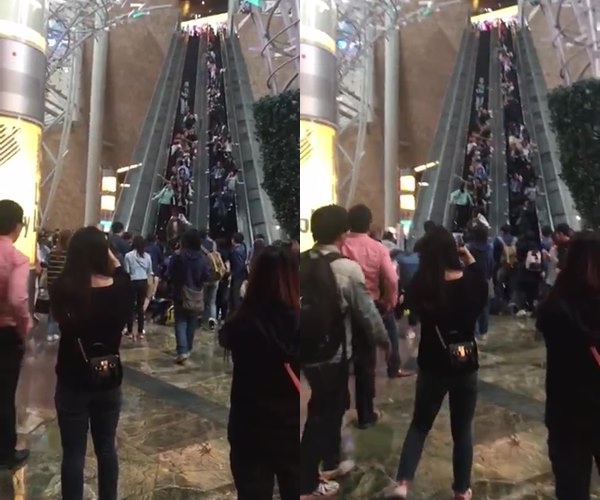 บันไดเลื่อนยาวสุดในฮ่องกง เลื่อนสวนทาง นักช้อปร่วงระนาว