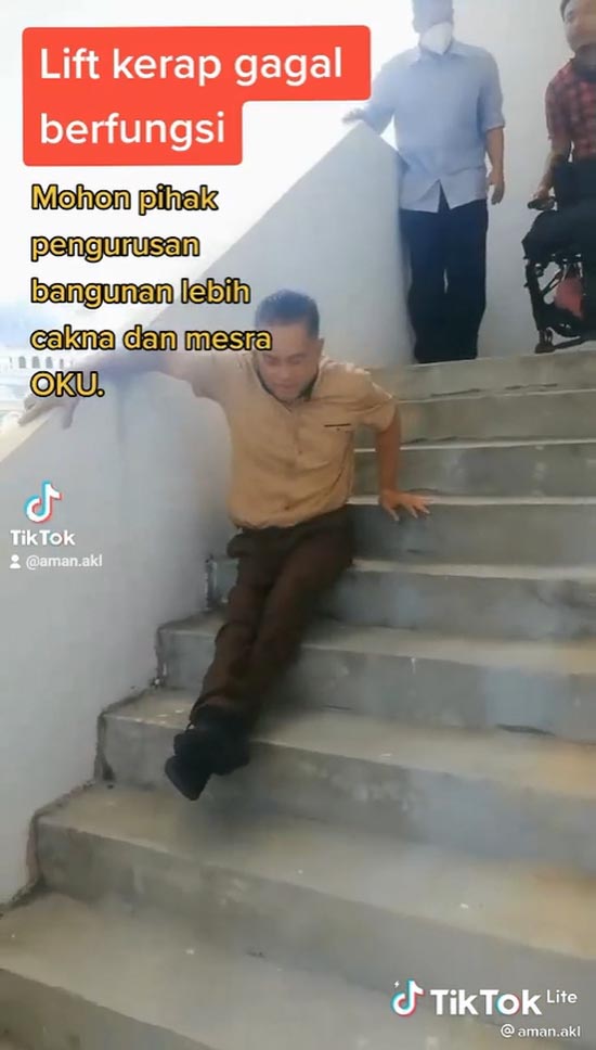 คนพิการ ใช้มือลงบันได