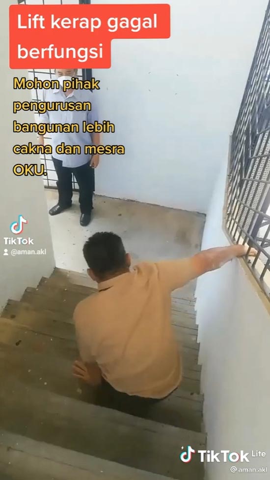 คนพิการ ใช้มือลงบันได