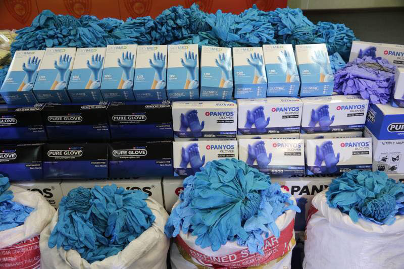 ทลายแก๊งขายถุงมือยางใช้แล้ว