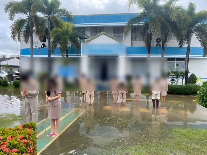 เจ้าหน้าที่ประปาร้องเพลงชาติตรงน้ำท่วม