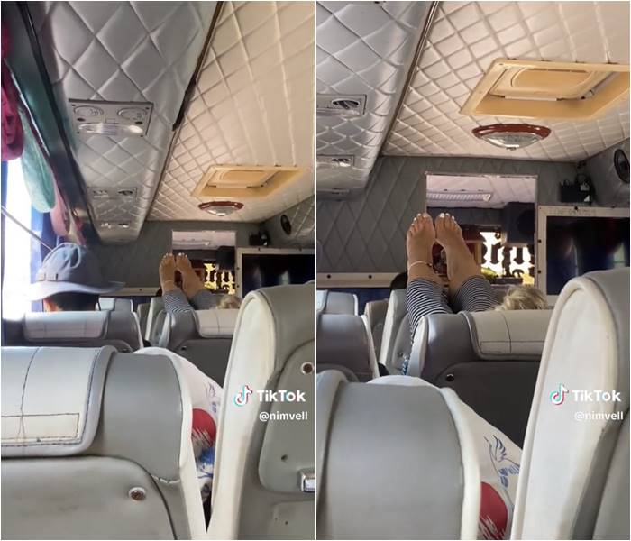 เท้าพาดเบาะบนรถบัสติดแอร์