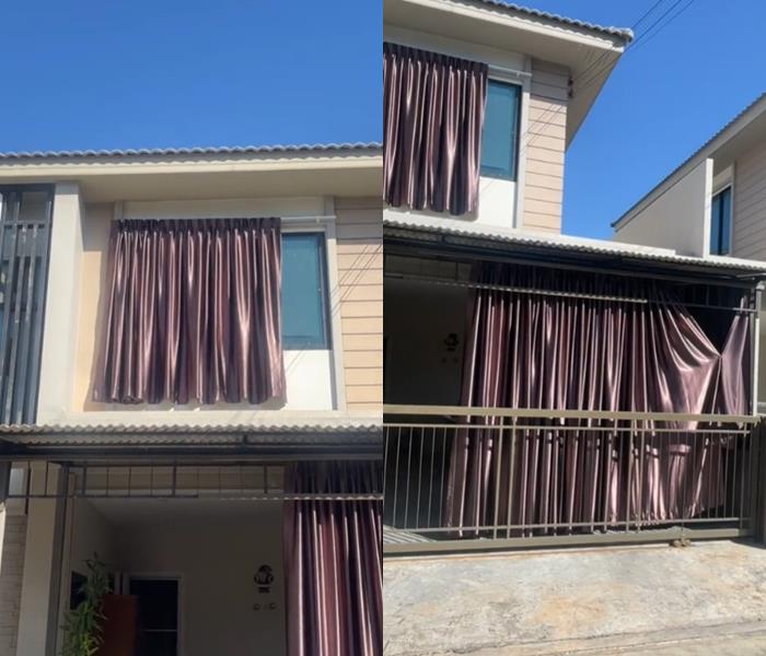 ติดผ้าม่านกันแดดส่องลานจอดรถ ทำเพื่อนบ้านผงะ