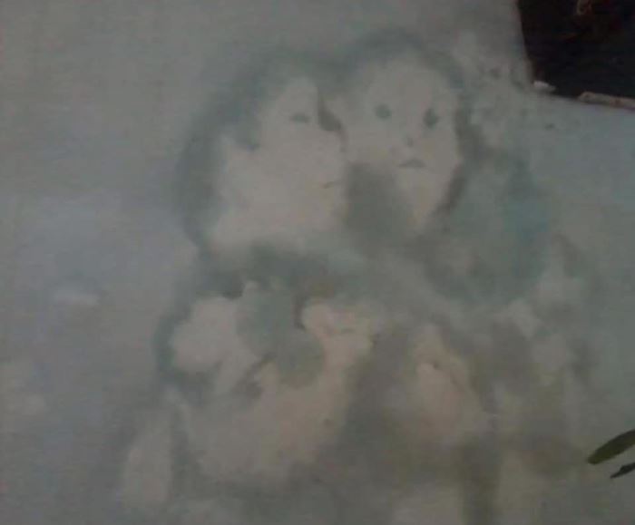 เรื่องลึกลับ ภาพคนบนผนัง