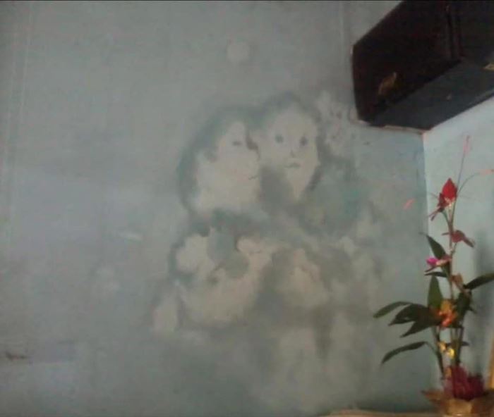 เรื่องลึกลับ ภาพคนบนผนัง