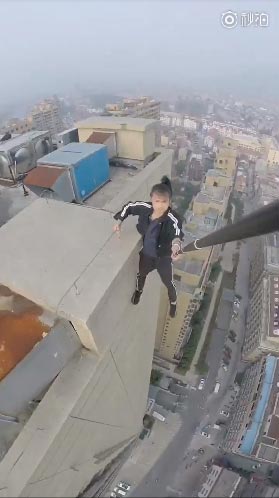 คนจีนปีนตึกเสียชีวิต