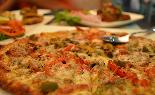  ร้านพิซซ่าอินเดียเจ๋ง ใช้โดรนส่งพิซซ่าบนตึกสูง