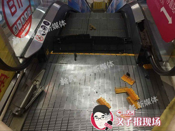 บันไดเลื่อนดูดขาพนักงานจีน