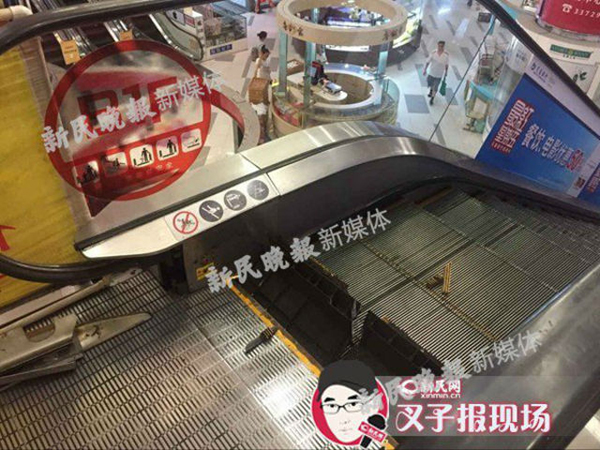 บันไดเลื่อนดูดขาพนักงานจีน