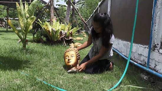 ยอมรื้อเศียรพระ