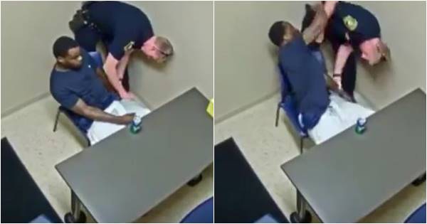 ฆาตกรไม่หายซ่า ขโมยปืนจากเอวตำรวจ ขณะนั่งในห้องสอบสวน (ชมคลิป)