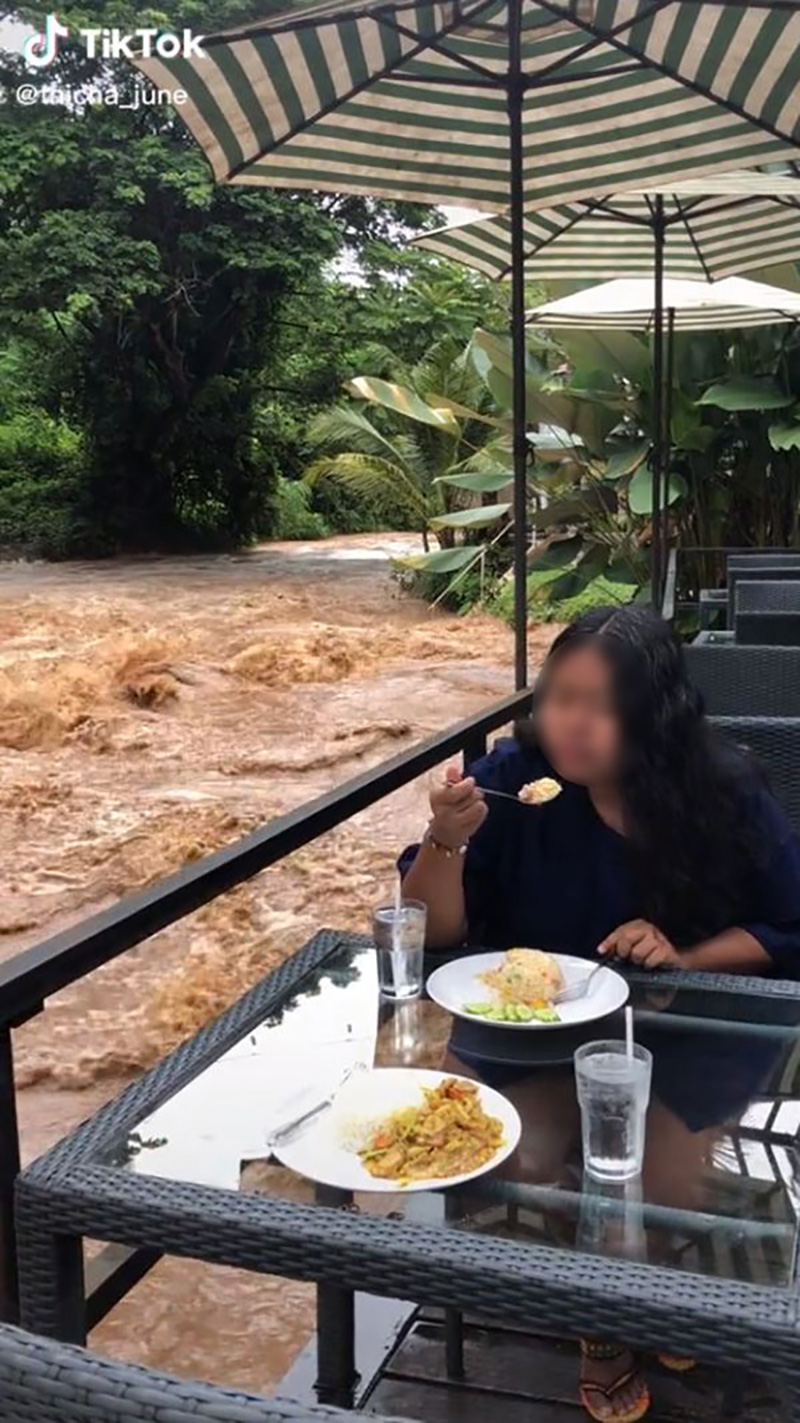 ไวรัลสาวนั่งชิลทานข้าว ท่ามกลางวิวภัยพิบัติระดับ 10