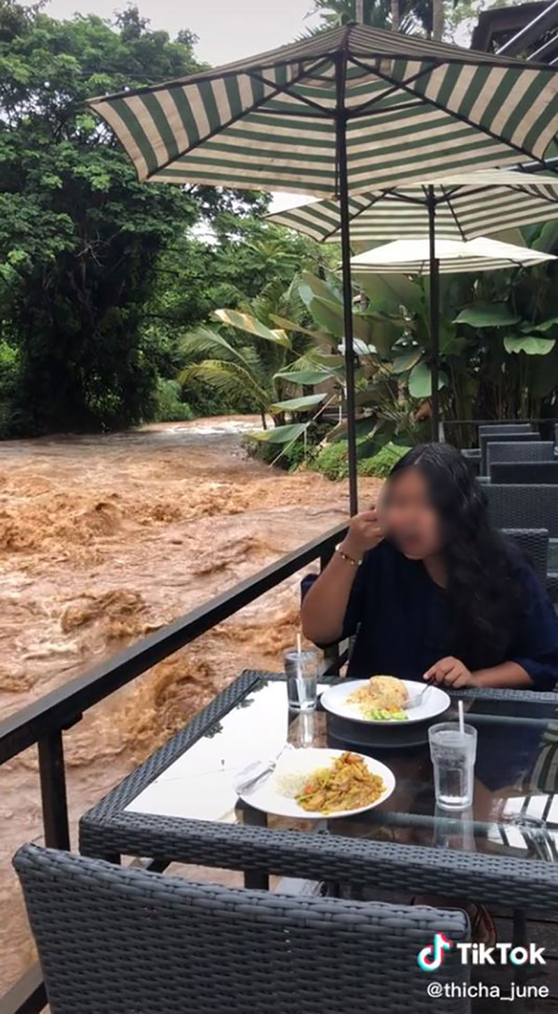 ไวรัลสาวนั่งชิลทานข้าว ท่ามกลางวิวภัยพิบัติระดับ 10